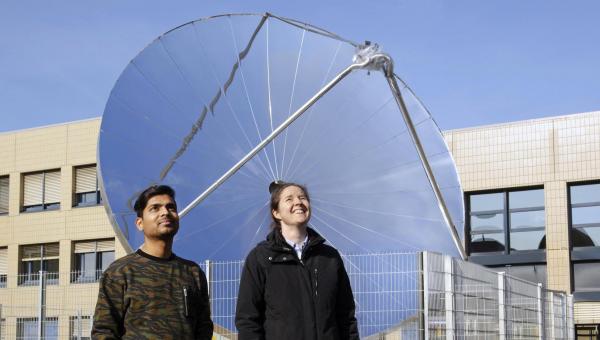 SOHHYtec co-founders in front of the prototype on EPFL campus