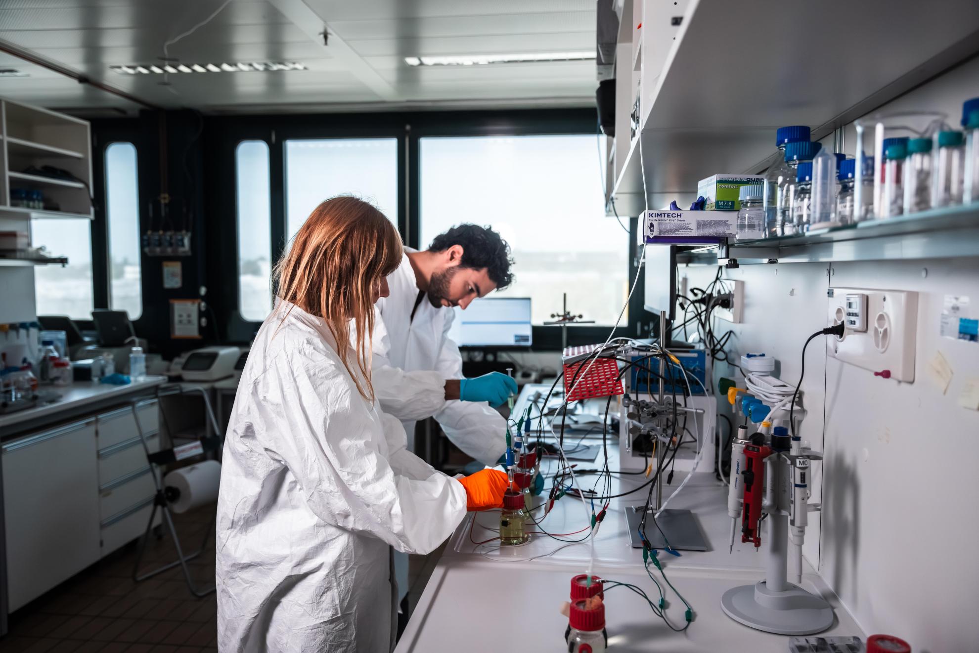 Working on a way to generate electricity from E. coli bacteria at EPFL laboratory in Lausanne. 